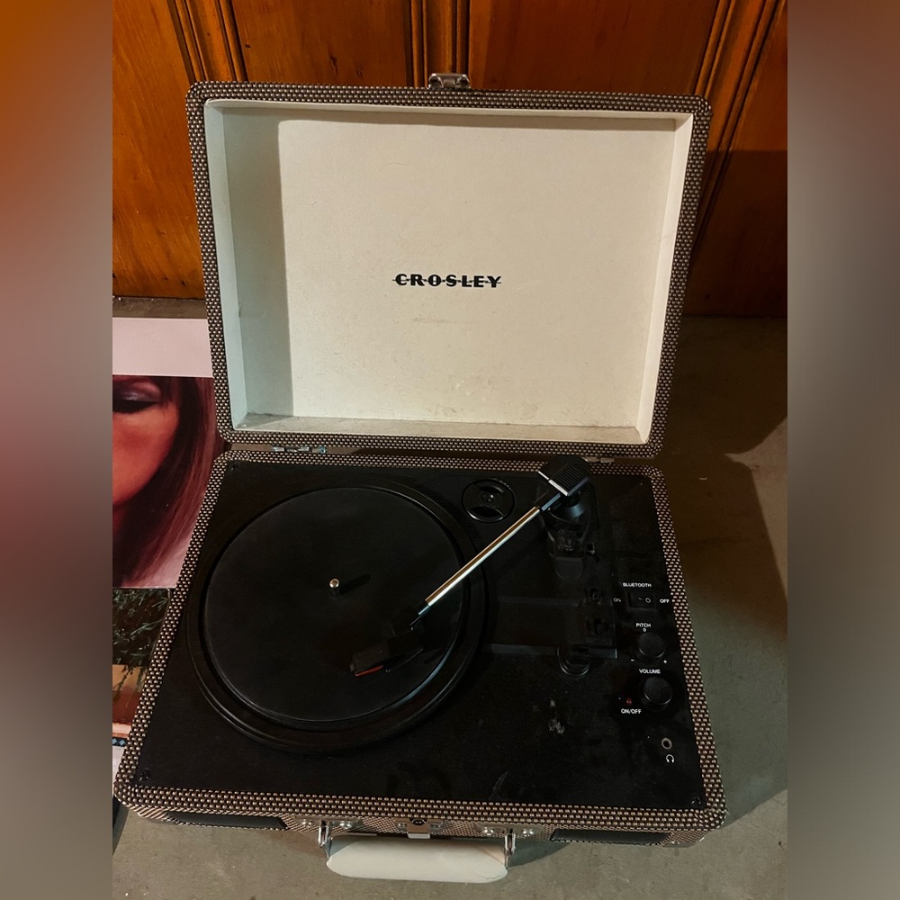 Crosley record player with two records